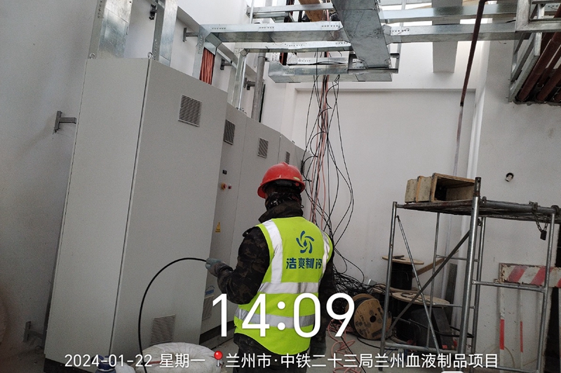Workers are laying out the wire