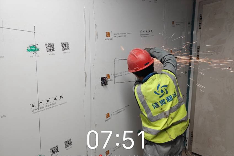 Workers are cutting the observation window